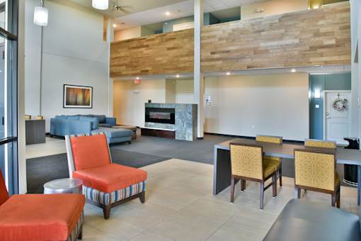 Lounge with Tables and Fireplace