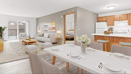a living room and dining room with a white table and chairs