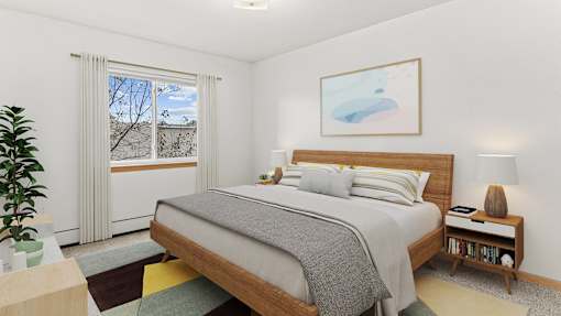 a bedroom with a bed and a window