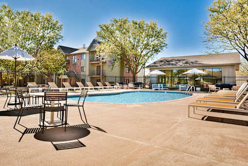 Outdoor Pool and Sundeck with Chairs