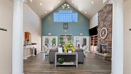 a living room with couches and a fireplace