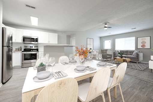 Renovated unit with stunning white shaker style cabinetry, stainless steel appliances, and separate dining area.