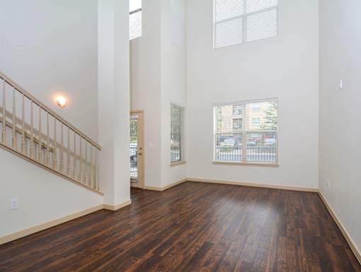 Multilevel unit with high ceilings, plenty of natural light from +3 windows, and gorgeous wood flooring.