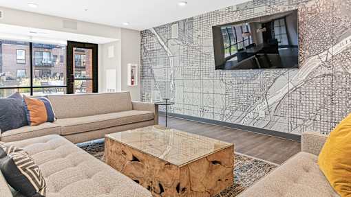 a living room with couches and a table