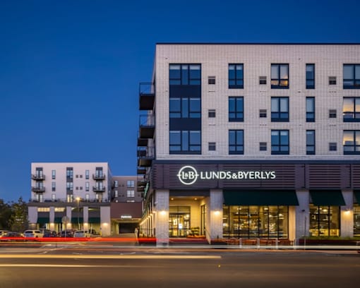 a large white building with a sign that reads lubbock brewers on the front of it