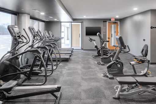 the gym at trillium apartments in fairfax, va