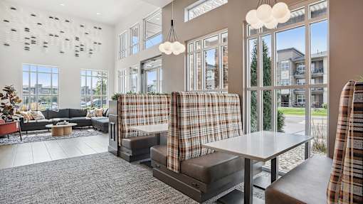 a living room with couches and a table