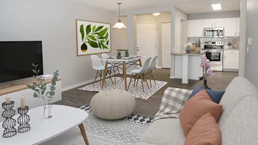 a living room and dining room with a table and chairs