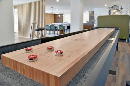 Shuffleboard and other games available in the clubroom.