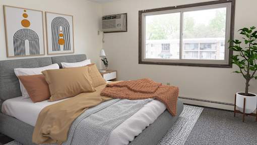 a bedroom with a bed and a window