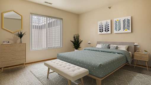 a bedroom with a bed and a dresser and a window