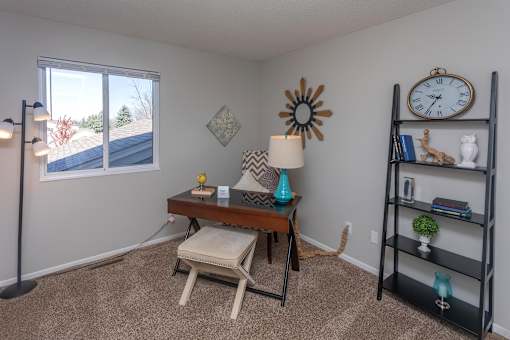 At Home Works Space with Desk Cabinets and Windows