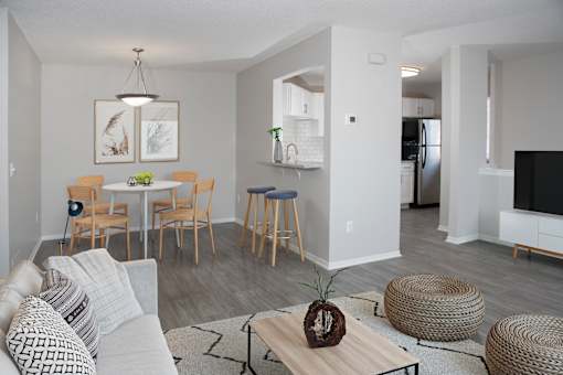 Dining Room with Table and Living Room with Sofa
