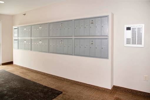 Secure mail area for package acceptance and delivery.