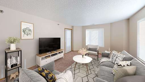 Open living space with bright natural light from large windows.