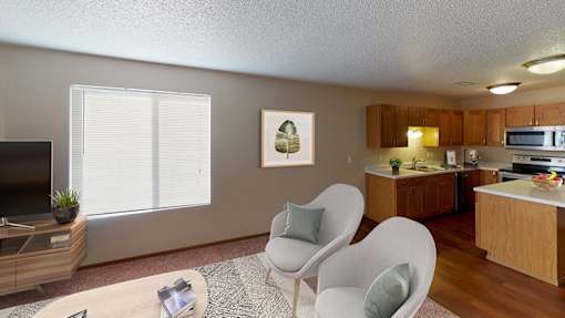 Living room with white rug and matching chairs