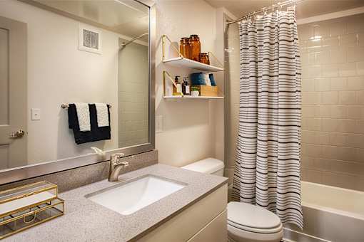 Bathroom with Granite Counters, Toilet and Shower