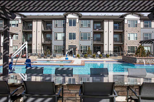 Large Table under Pergola on Outdoor Pool Sundeck