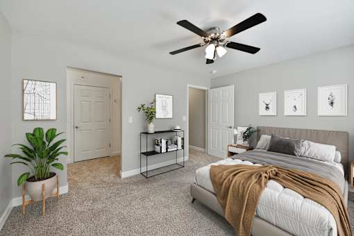 Bedroom with Bed and Fan