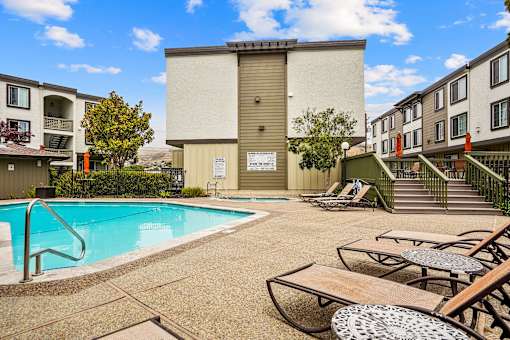 our apartments have a pool and lounge chairs