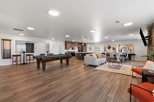 a living room with a fireplace and a television at Red Rock Apartments, Rapid City, SD, 57702