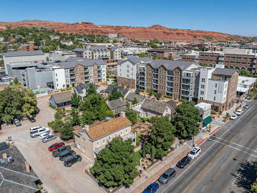 an aerial view of apartments in a city with a mountain in the background at City View St. George Apartments, Utah, 84770