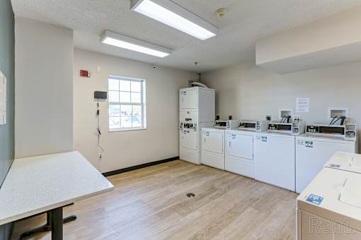 A laundry room with a washer and dryer.