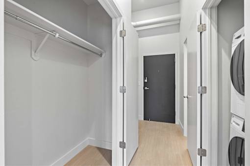 A laundry room with a washer and dryer.