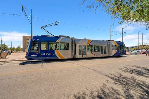 A blue and grey train at Bautista Apartments, Tucson, AZ