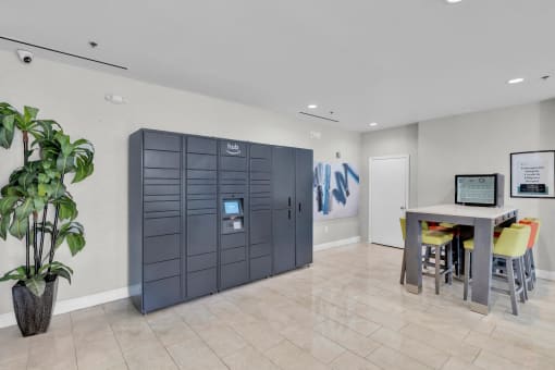 an office with a desk and a black door
