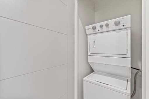 A white dishwasher is installed in a kitchen.