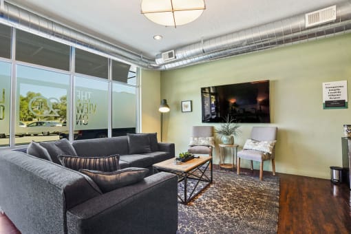 a living room with two couches and a coffee table at The View on 20th, Utah