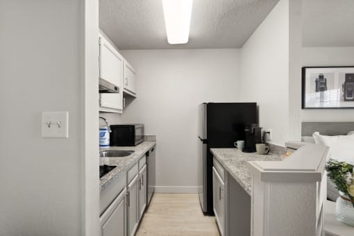 our apartments offer a kitchen with stainless steel appliances and granite counter tops