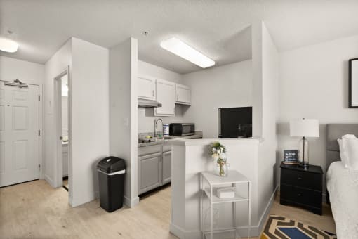 the living room and kitchen of our studio apartments atrium studio apartments