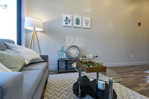 Living room with couch at Brickside Heights Apartments, Millcreek, UT, 84106