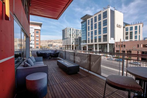 balcony with a view of the city at Paperbox Lofts, Salt Lake City