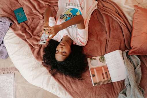 A person is lying on a bed at Bautista Apartments, Arizona, 85745