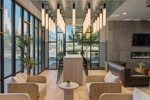 lobby with couches and a bar at SevenO2 Main Apartments, Utah, 84101