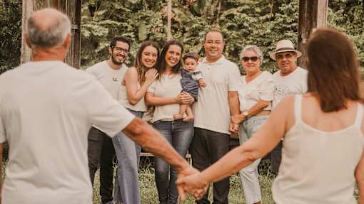 A family holding hands at Bautista Apartments, Arizona