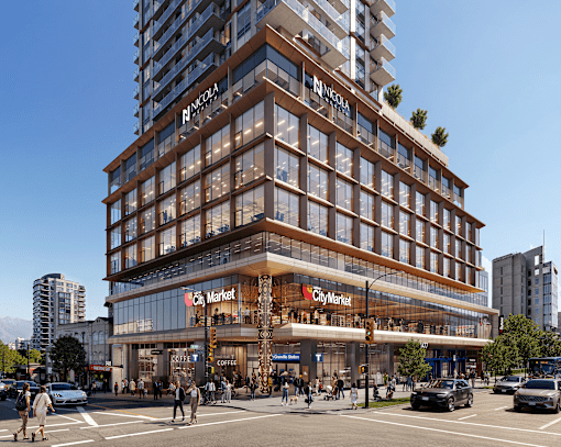 A modern building with a glass facade and the words "City Market" on the front.