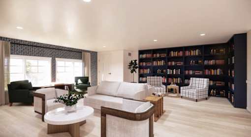 Modern living room with built in library wall at Chestnut Oaks Apartments, Fort Washington, Maryland