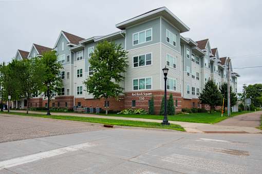 A large building with the words "Flock Square" on the front.