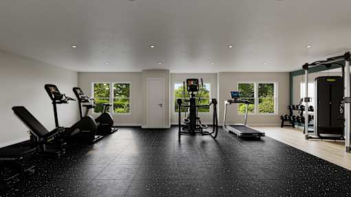 A spacious home gym with a variety of equipment.