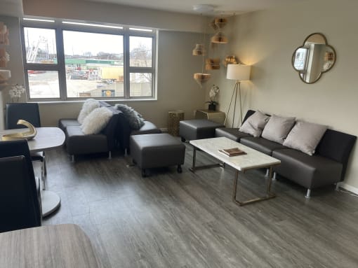 a living room with couches and a coffee table