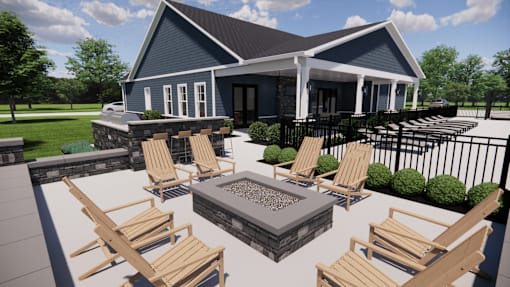 A house with a patio and chairs.
