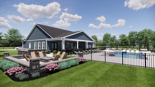 A house with a pool and a black fence.