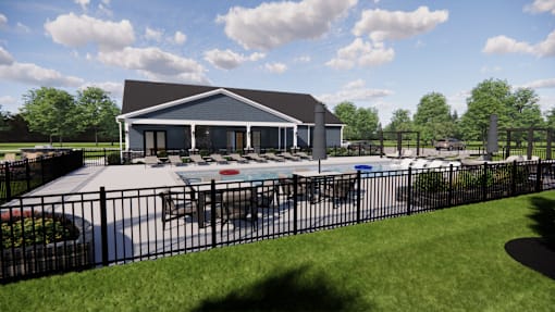 A black fence surrounds a house with a pool.