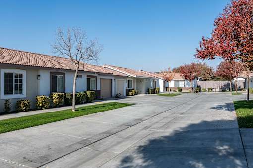 a street with houses on the side of a road