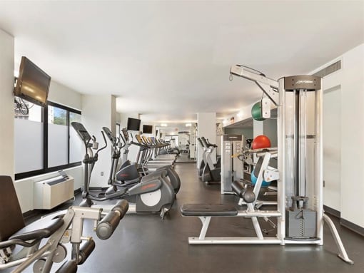 Steppers, treadmills, and weight machines inside the Prospect Place fitness center  at Prospect Place, New Jersey