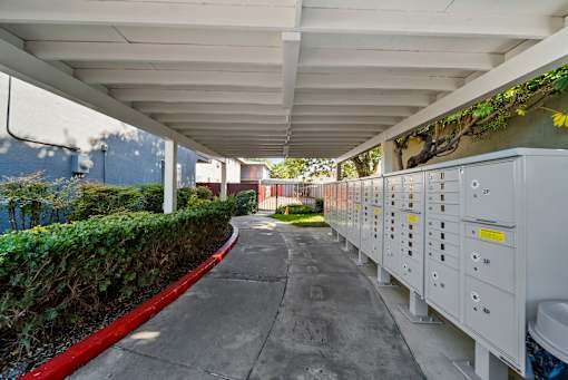 A long corridor with electrical boxes on the side.